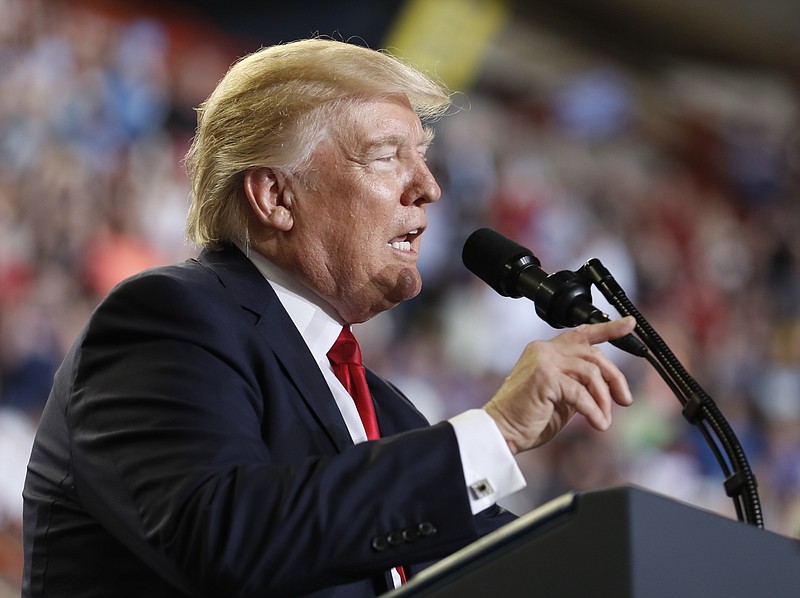 
              President Donald Trump speaks at the Pennsylvania Farm Show Complex and Expo Center in Harrisburg, Pa., Saturday, April 29, 2017, on the 100th day of his presidency. (AP Photo/Carolyn Kaster)
            