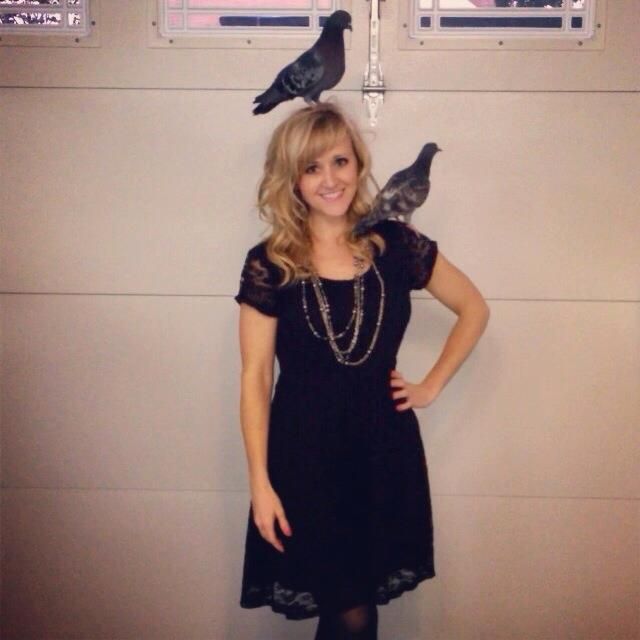 Sherry Turner Teas poses with her pigeons, Russell, left, and Haley.
