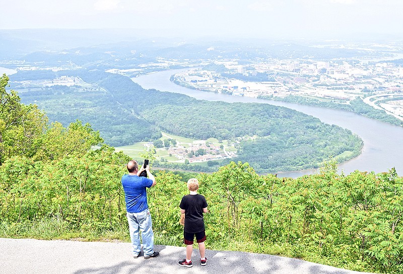 Chris and James Ogren, left to right, look out over Moccasin Bend and Chattanooga from Point Park on Lookout Mountain.