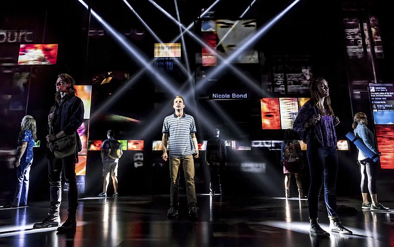 
              This image released by O&M/DKC shows Ben Platt, center, during a performance of "Dear Evan Hansen." Platt, the star of “Dear Evan Hansen,” with songs by Benj Pasek and Justin Paul, the recent Oscar winners for "City of Stars" from the movie “La La Land,” is a shoo-in for a nomination for best actor in a musical. Tony Award nominations will be announced on Tuesday, May 2, 2017.  (Matthew Murphy/O&M/DKC via AP)
            