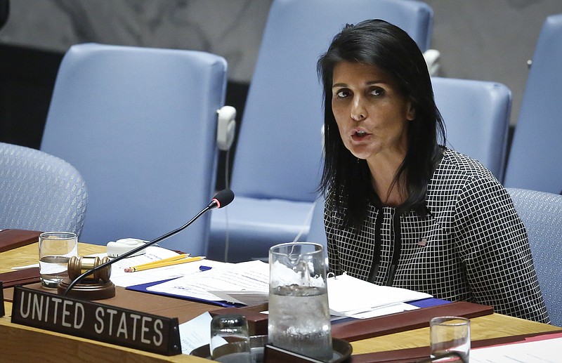 
              FILE - In this April 12, 2017 file photo, U.S. UN Ambassador Nikki Haley address the Security Council after a vote on a resolution condemning Syria's use of chemical weapons failed, at U.N. headquarters. Haley didn’t wait to take office as America’s envoy to the United Nations to break with the Trump administration’s foreign policy stances.  At her Senate confirmation hearing, Haley bluntly accused Russia of being complicit of war crimes in Syria _ going against the president-elect’s talk of warmer relations with Moscow.(AP Photo/Bebeto Matthews, File)
            