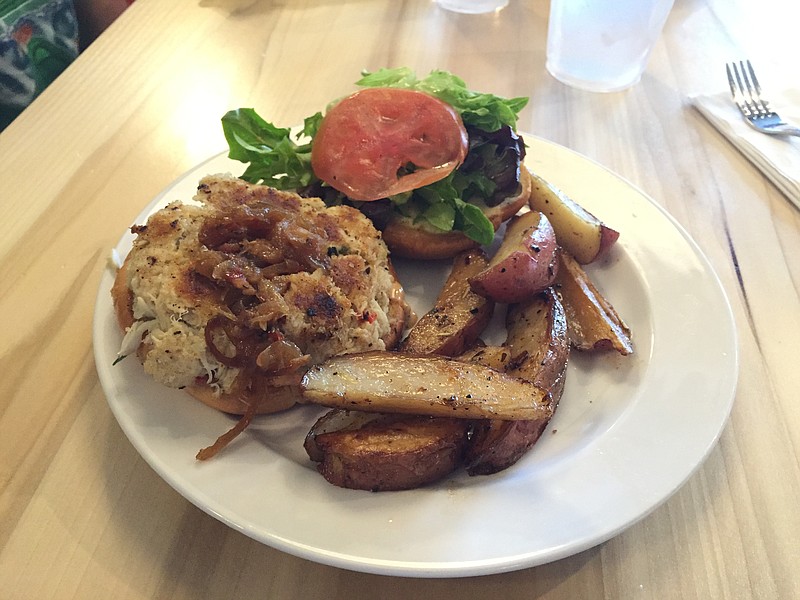 The Crab Cake Sandwich, which is available all day, is smeared with cajun remoulade and topped with bacon marmalade, lettuce and tomato. It's served with herb-roasted potatoes for $13.