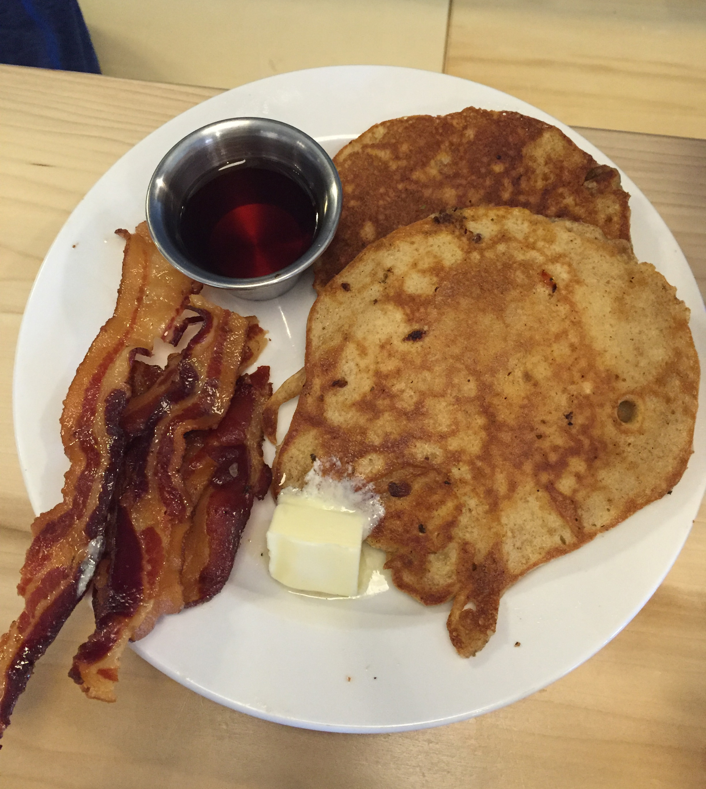 The Bob comes with two good-size whole-grain pancakes along with a choice of two sides. We opted for a double portion of Broadbent's bacon for sharing. Frothy Monkey serves breakfast until 5 p.m.