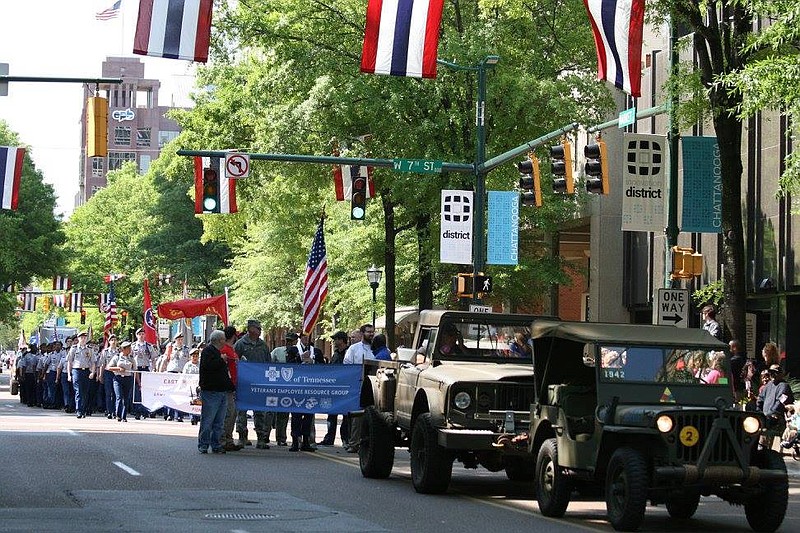 Spectators line Market Street to watch last year's Armed Forces Day parade.