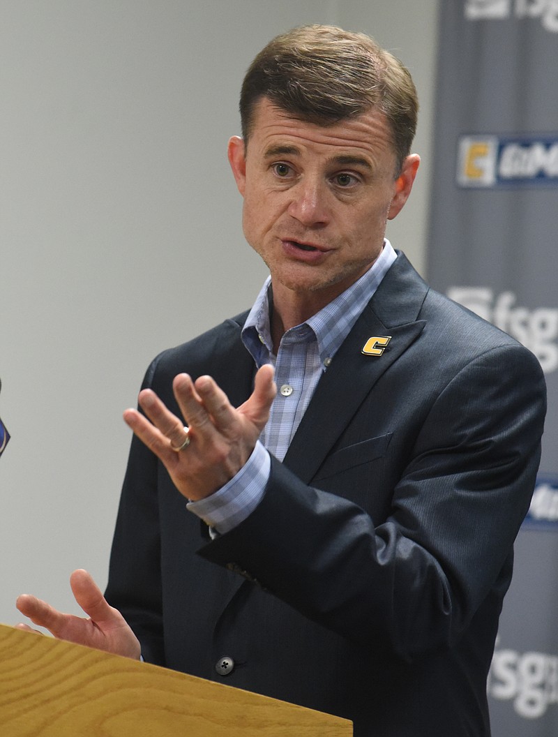 University of Tennessee at Chattanooga Athletic Director David Blackburn speaks at a news conference Tuesday, Apr. 7, 2015, in Chattanooga, Tenn., officially announcing that men's basketball coach Will Wade has resigned his position to become head coach at VCU. 