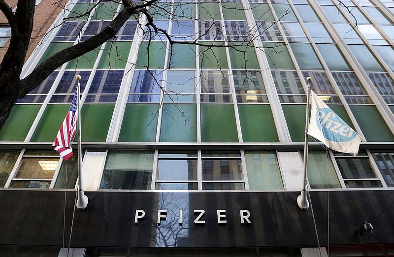 
              FILE - In this Monday, Nov. 23, 2015, file photo, flags fly in front of Pfizer World Headquarters, in New York. Pfizer Inc. reports earnings, Tuesday, May 2, 2017. (AP Photo/Mark Lennihan, File)
            