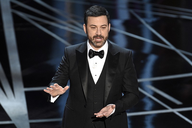 
              FILE - In this Sunday, Feb. 26, 2017, file photo, host Jimmy Kimmel speaks at the Oscars at the Dolby Theatre in Los Angeles. Kimmel says his newborn son is home and doing great after open-heart surgery. A tearful Kimmel turned his show's monologue Monday, May 1, into an emotional recounting of the crisis with what Kimmel called a "happy ending." (Photo by Chris Pizzello/Invision/AP, File)
            