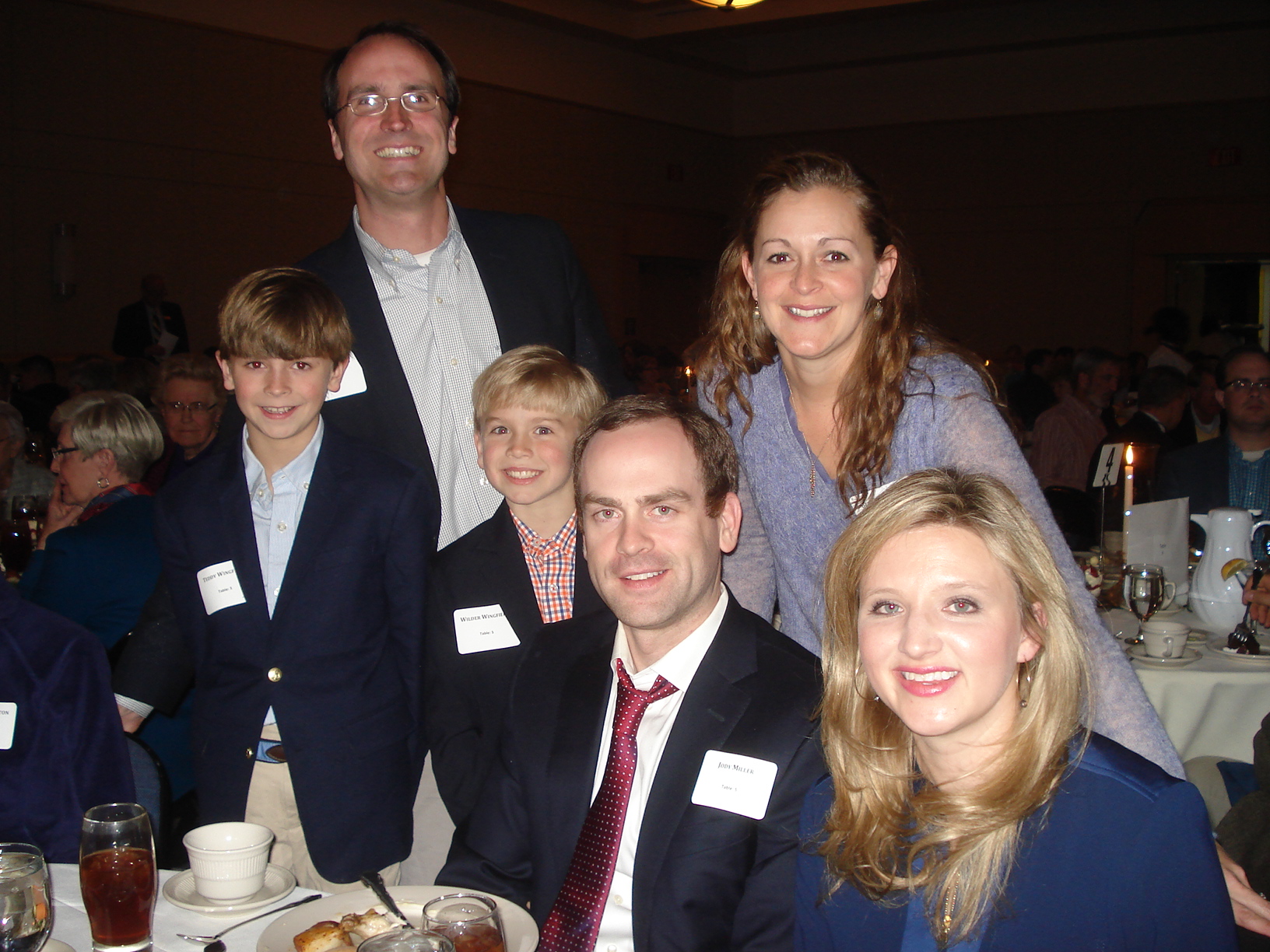 Jody and Kirstin Miller, seated, with Teddy, Joseph, Wilder and Beth Wingfield, standing, from left.