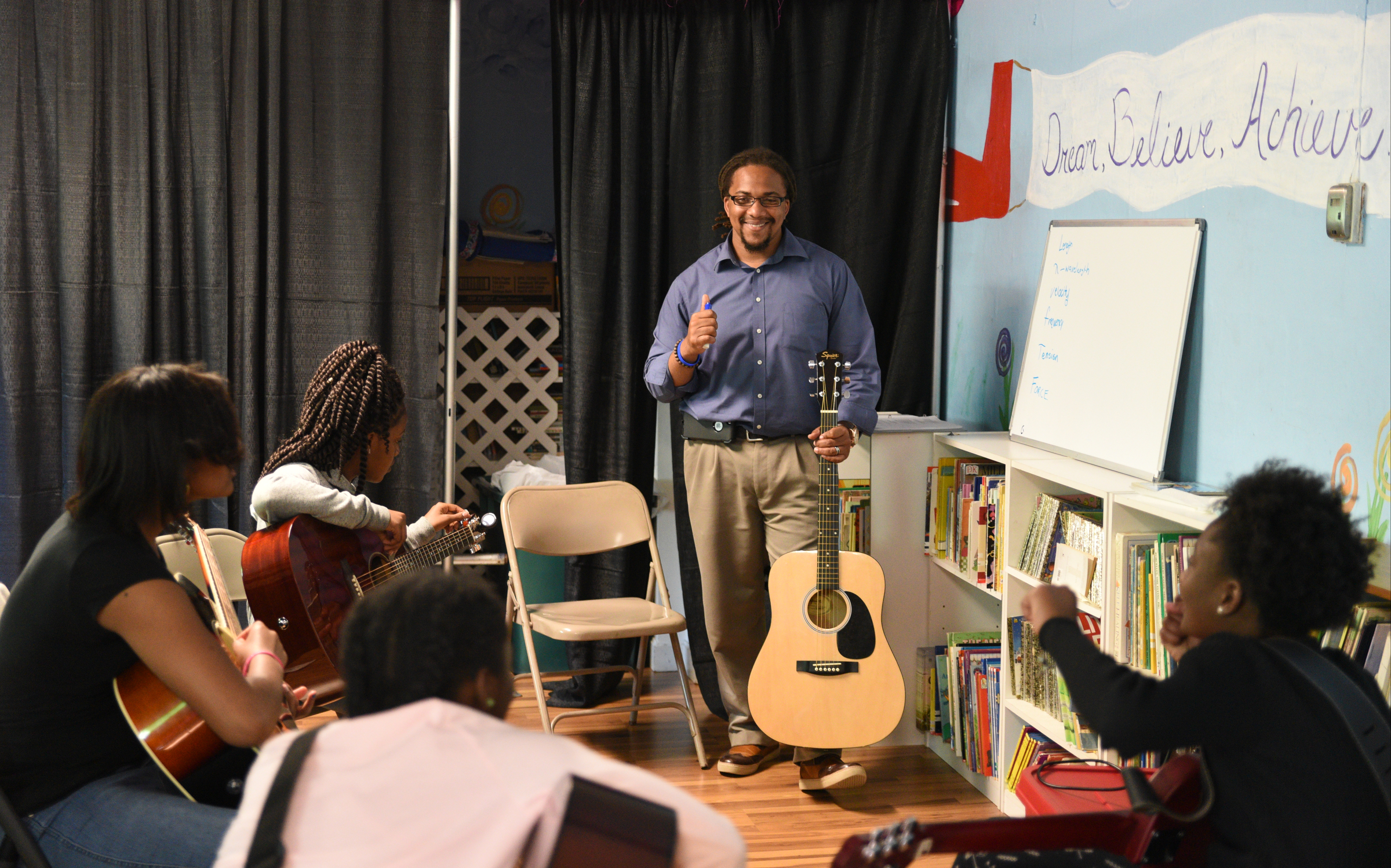 David Yancey teaches a music-based physics lesson Wednesday, April 26, 2017 at Temple of Faith Deliverance Church.