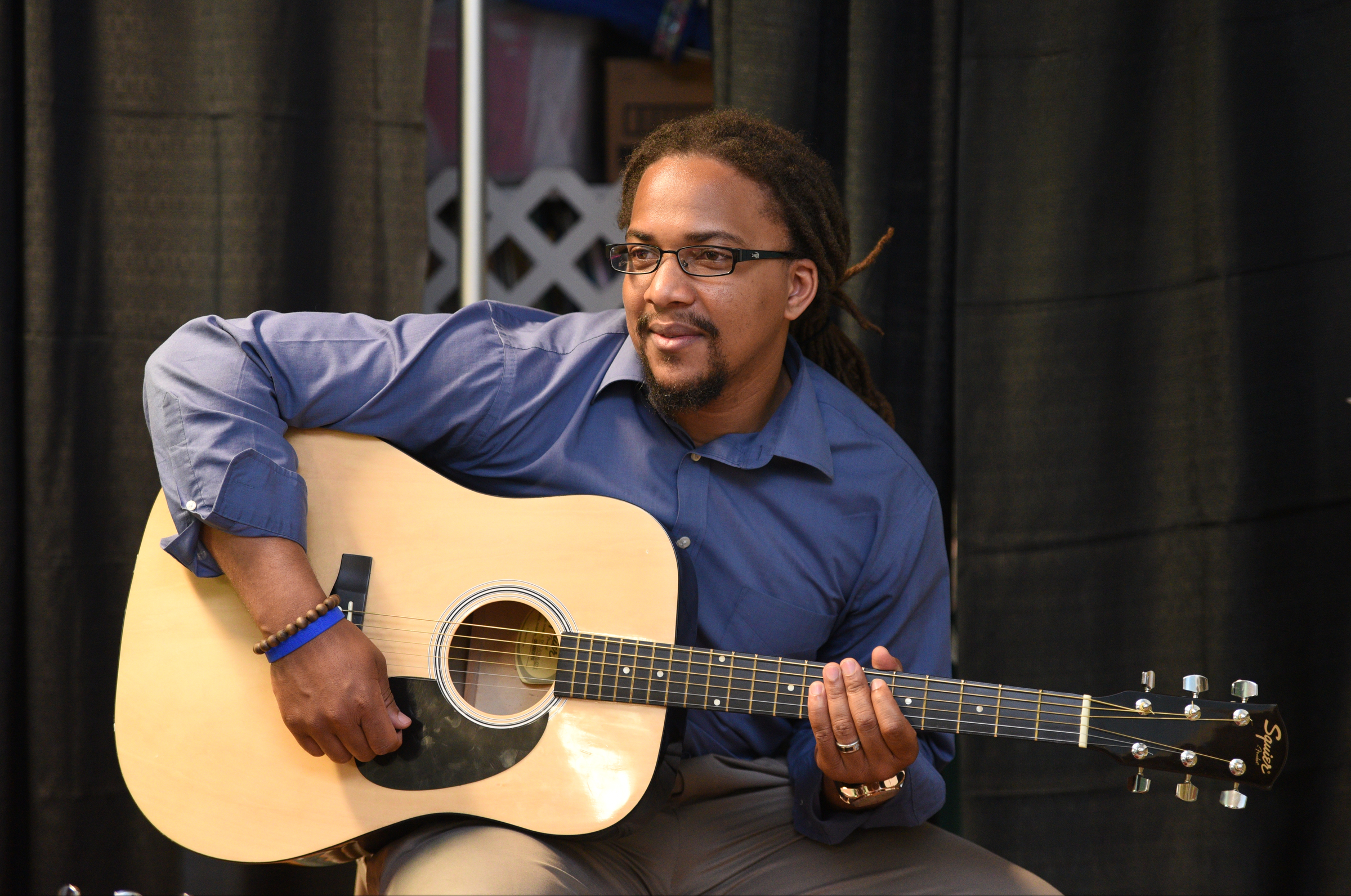 David Yancey plays guitar Wednesday, April 26, 2017 at Temple of Faith Deliverance Church.