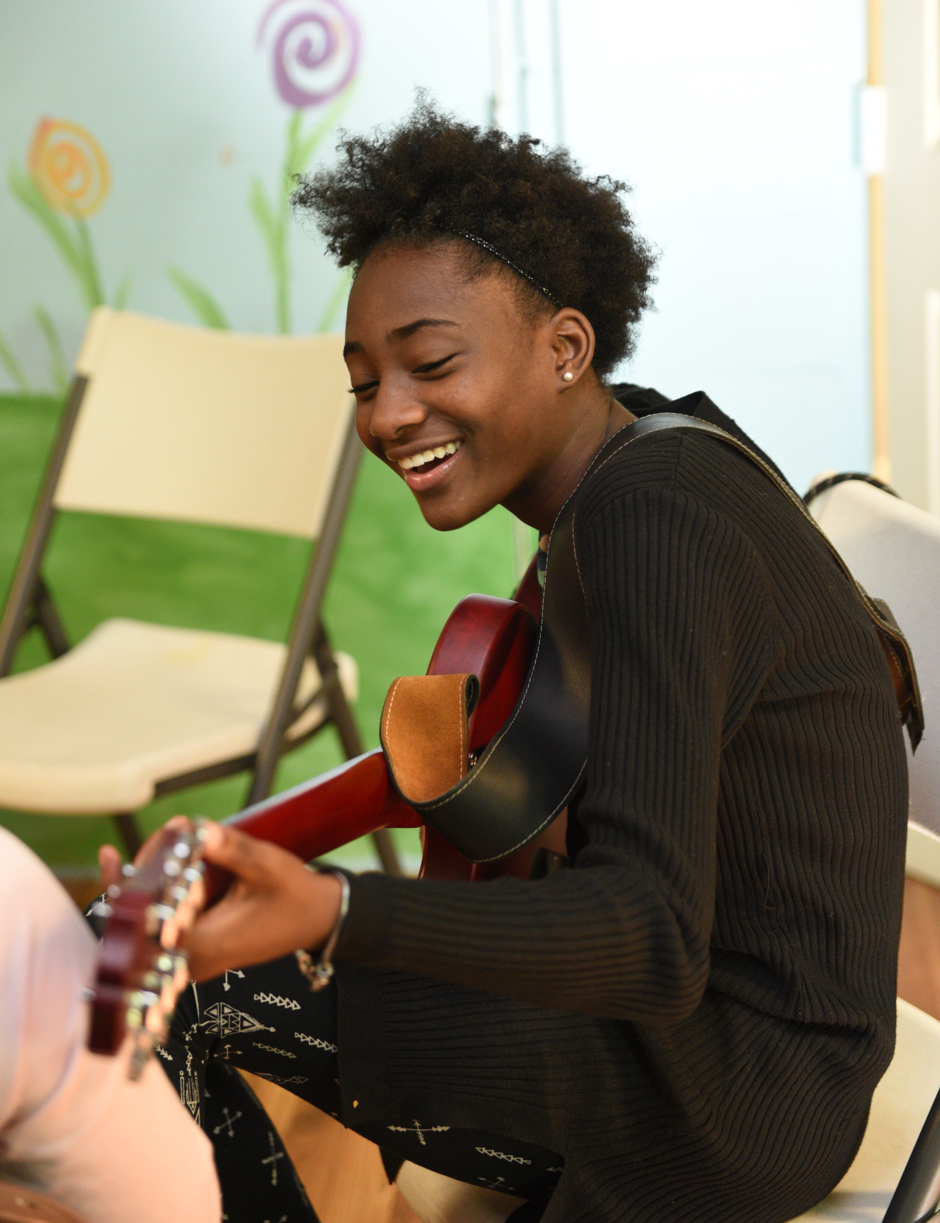 Kaylyn Yancey plays her guitar Wednesday, April 26, 2017 at Temple of Faith Deliverance Church.