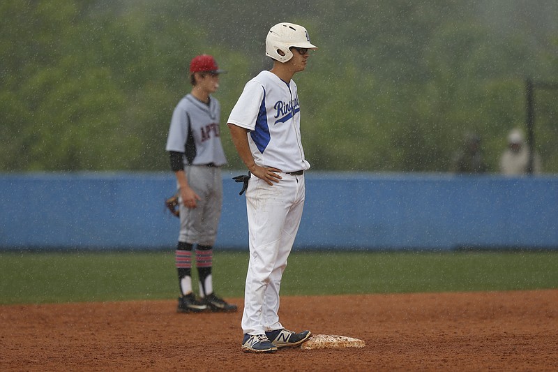 Ringgold runner Hunter Ricketts stands at 2nd in pouring rain during their prep baseball playoff game against Appling County at Ringgold High School on Thursday, May 4, 2017, in Ringgold, Ga.