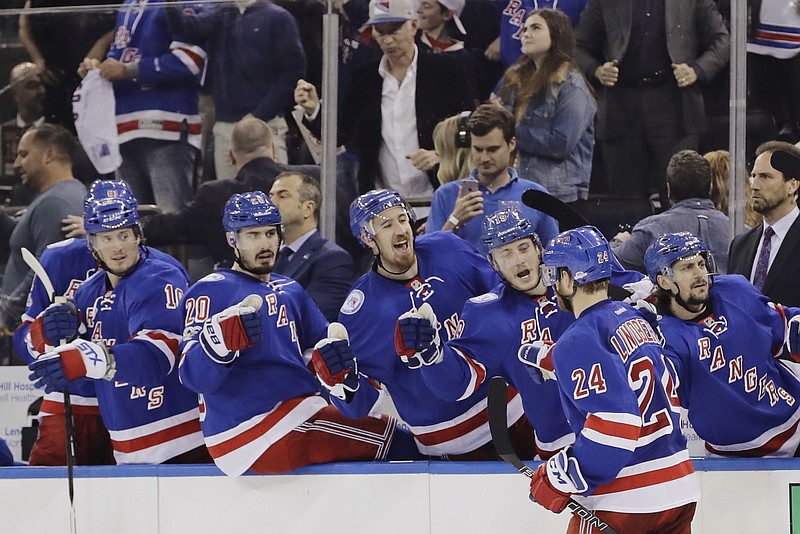 
              New York Rangers center Oscar Lindberg (24) celebrates with teammates after scoring a goal during the second period of Game 4 of an NHL hockey Stanley Cup second-round playoff series against the Ottawa Senators Thursday, May 4, 2017, in New York. (AP Photo/Frank Franklin II)
            