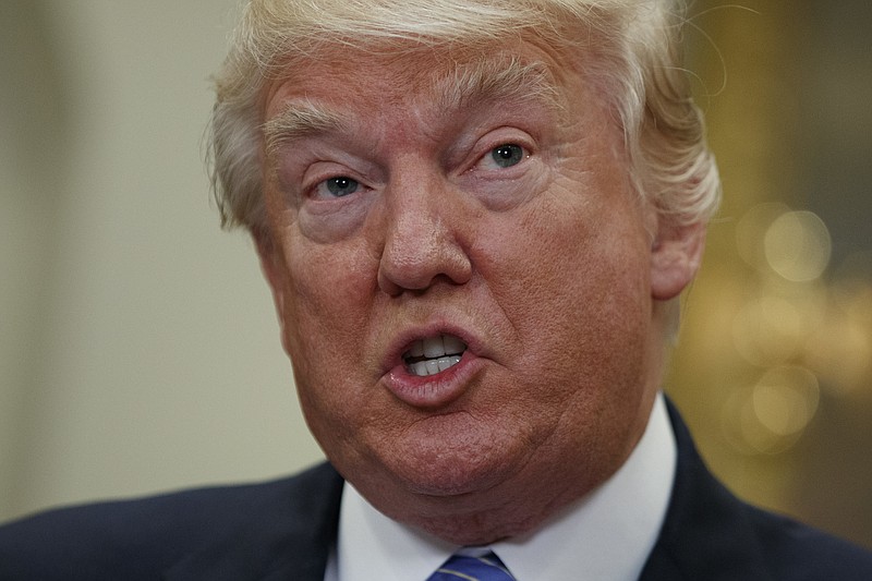 
              FILE - In this Wednesday, May 3, 2017, file photo, President Donald Trump speaks during a school choice event in the Roosevelt Room of the White House in Washington. Trump plans to sign an executive order Thursday, May 4, targeting a rarely enforced IRS rule that says churches that endorse political candidates risk losing their tax-exempt status. (AP Photo/Evan Vucci, File)
            