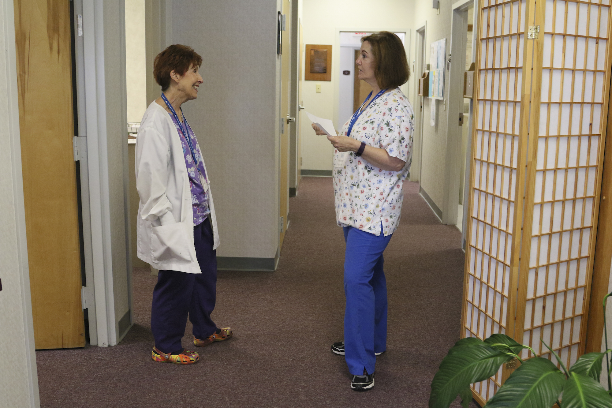Sandy Harrington, left, speaks to Cindy Hindmon while at Volunteers In Medicine. VIM has received a $35,000 grant to do preventive care for people with diabetes