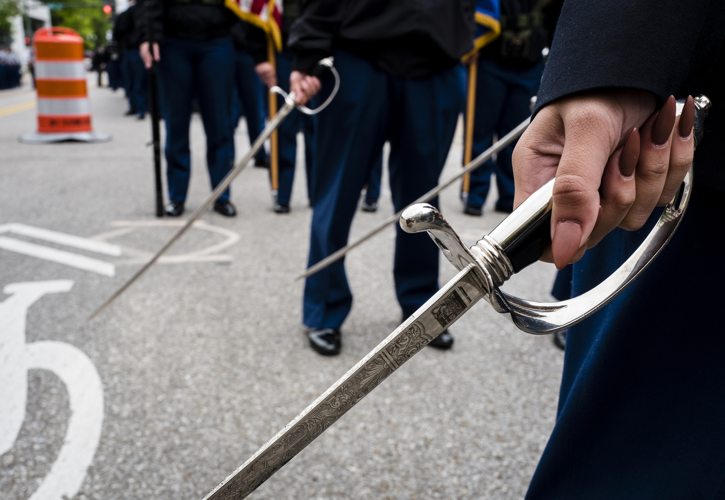 A JROTC cadet holds a sword during the annual Armed Forces Day Parade on Market Street on Friday, May 5, 2017, in Chattanooga, Tenn. This year's parade highlighted the United States Air Force.