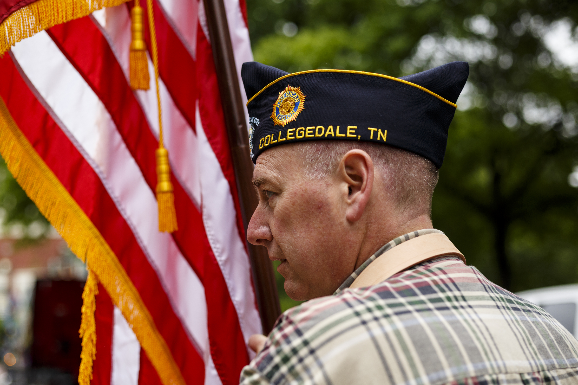 U.S. Army Veteran with the American Legion post 257 Paul Bobenhausen carries an American flag during the annual Armed Forces Day Parade on Market Street on Friday, May 5, 2017, in Chattanooga, Tenn. This year's parade highlighted the United States Air Force.