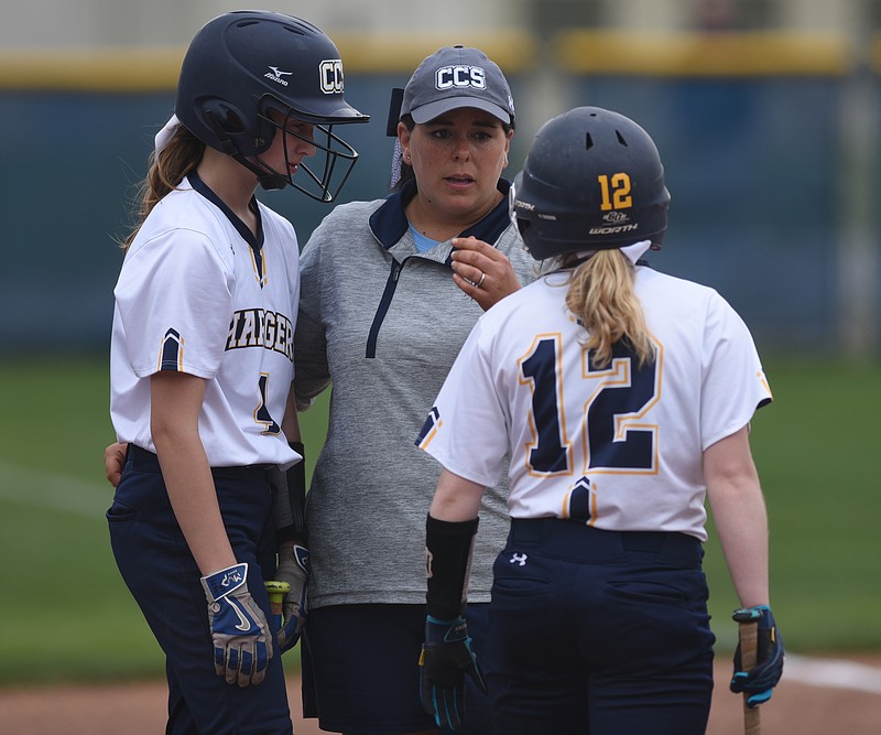 Chattanooga Christian coach Lisa Gray, talking with Madison Vandergriff, left, and Anslee Walker, has turned a softball program that was dormant two years ago into the 2017 District 7-AA regular-season champion.