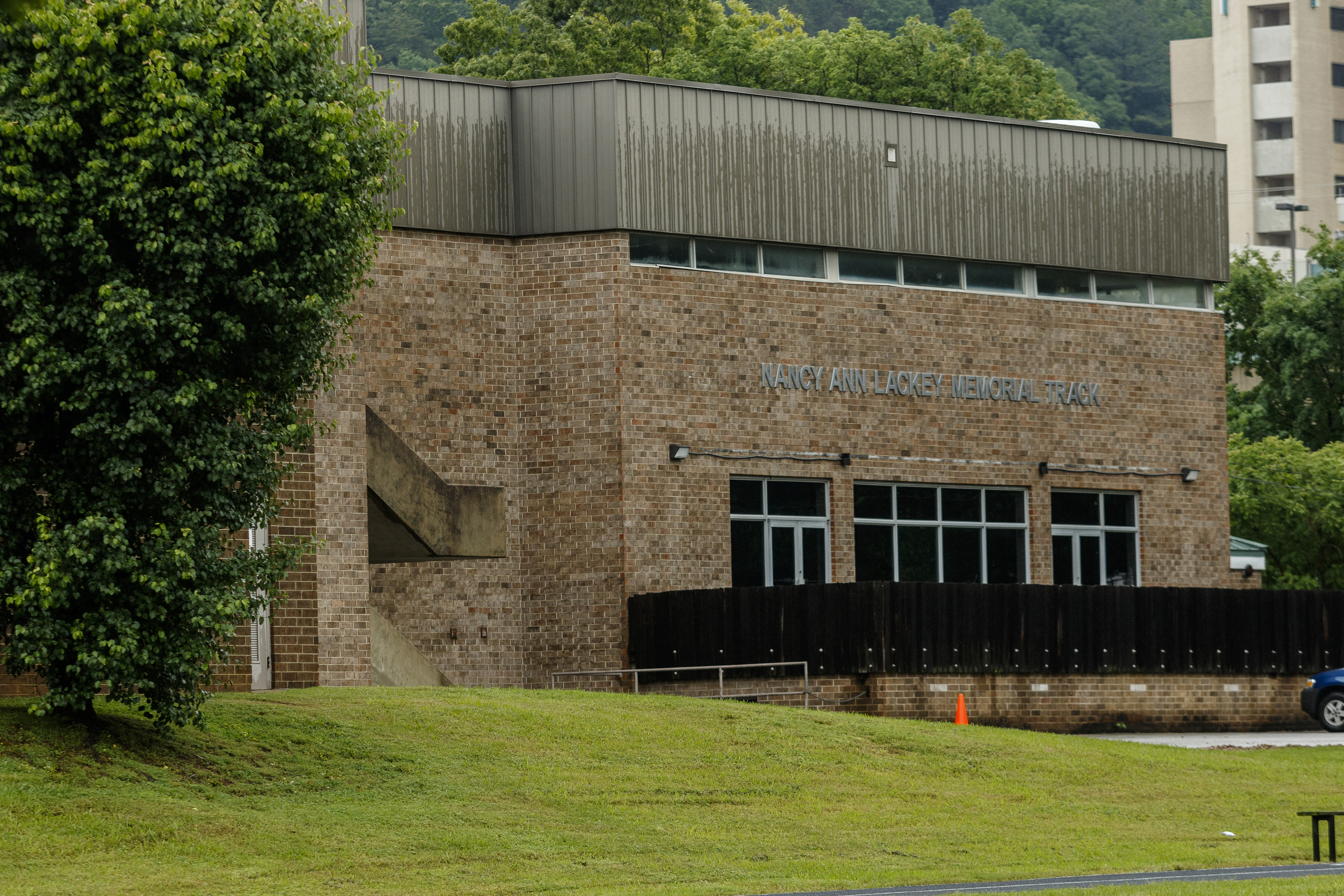 The Nancy Anne Lackey Memorial Track building on Orange Grove Center's campus is seen on Thursday, May 4, 2017, in Chattanooga, Tenn. The center has had numerous complaints about patient care, and a client was found dead on an Orange Grove bus last month.