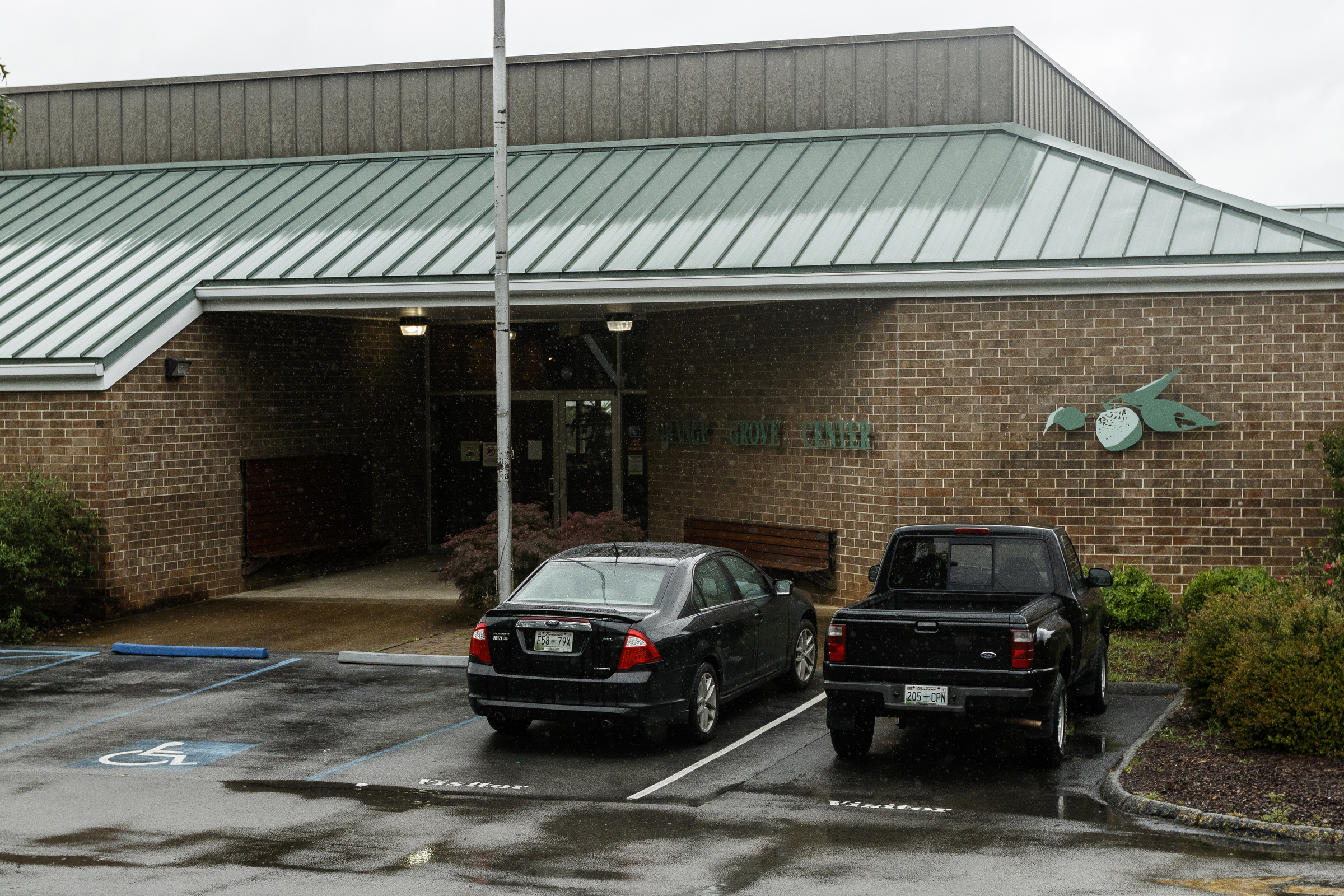 The entrance to Orange Grove Center is seen on Thursday, May 4, 2017, in Chattanooga, Tenn. The center has had numerous complaints about patient care, and a client was found dead on an Orange Grove bus last month.