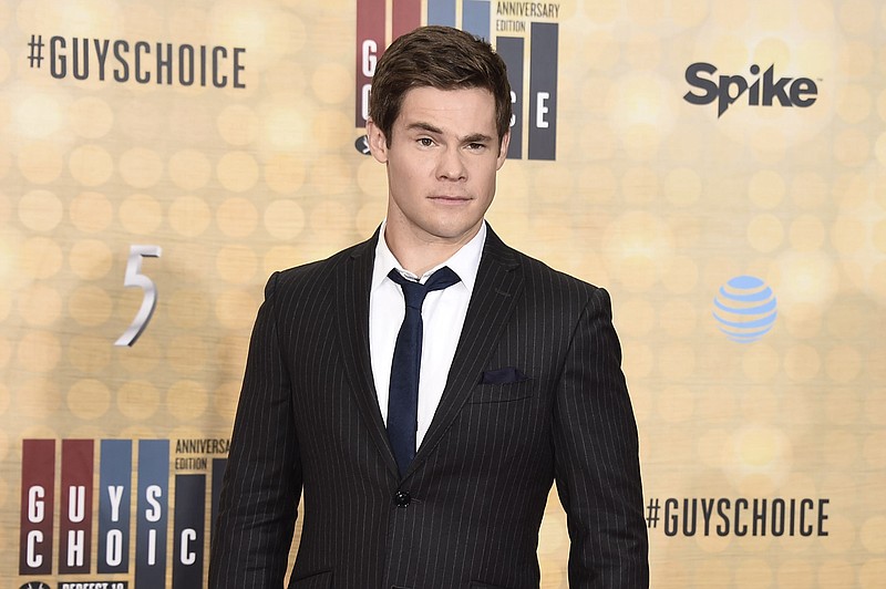 
              FILE - In this June 4, 2016 file photo, Adam Devine arrives at the Guys Choice Awards at Sony Pictures Studios in Culver City, Calif. MTV is heralding the start of summer viewing season with its Movie & TV Awards on Sunday, May 7, 2017. Hosted by actor Devine, the MTV Movie & TV Awards will also feature sneak peeks of anticipated films including "Transformers: The Last Knight" and "Spider-Man: Homecoming." (Photo by Dan Steinberg/Invision/AP, File)
            