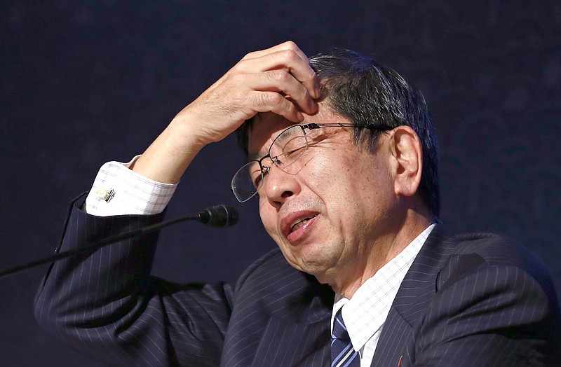
              Asian Development Bank (ADB) President Takehiko Nakao reacts as he listens to a reporter's question during the closing press conference of an ADB annual meeting in Yokohama, near Tokyo, Sunday, May 7, 2017. Nakao said Sunday he is hoping the U.S. will step up and support the regional lender despite President Donald Trump's avowed preference for bilateral cooperation. (AP Photo/Shizuo Kambayashi)
            
