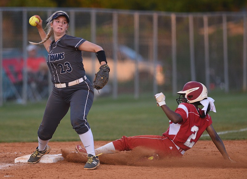 Soddy-Daisy third baseman Aminah Wood steps on the bag to force Ooltewah's Tiera Lemon out and throws to first to complete the double play Monday, May 8, 2017 at Walker Valley High School.
