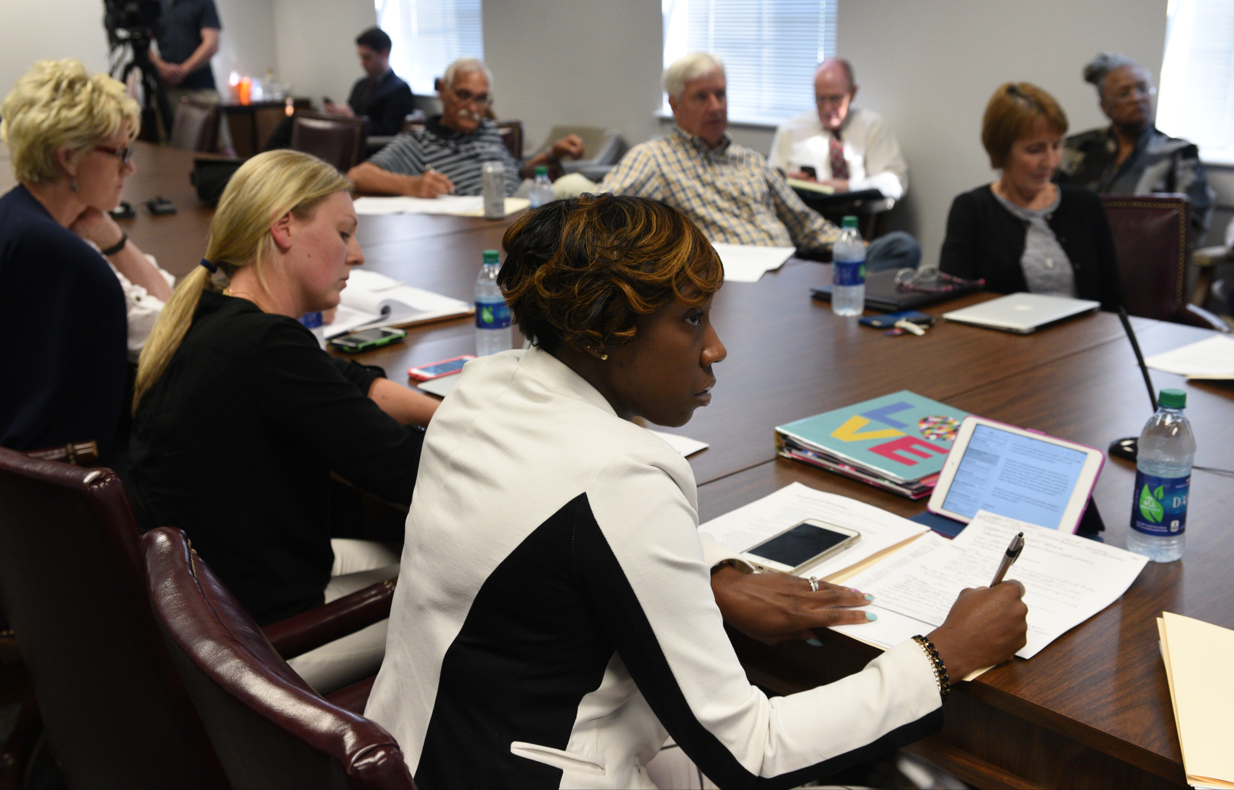 School board members listen as superintendent candidate Stuart Greenberg speaks Monday, May 8, 2017 in the superintendent's conference room.