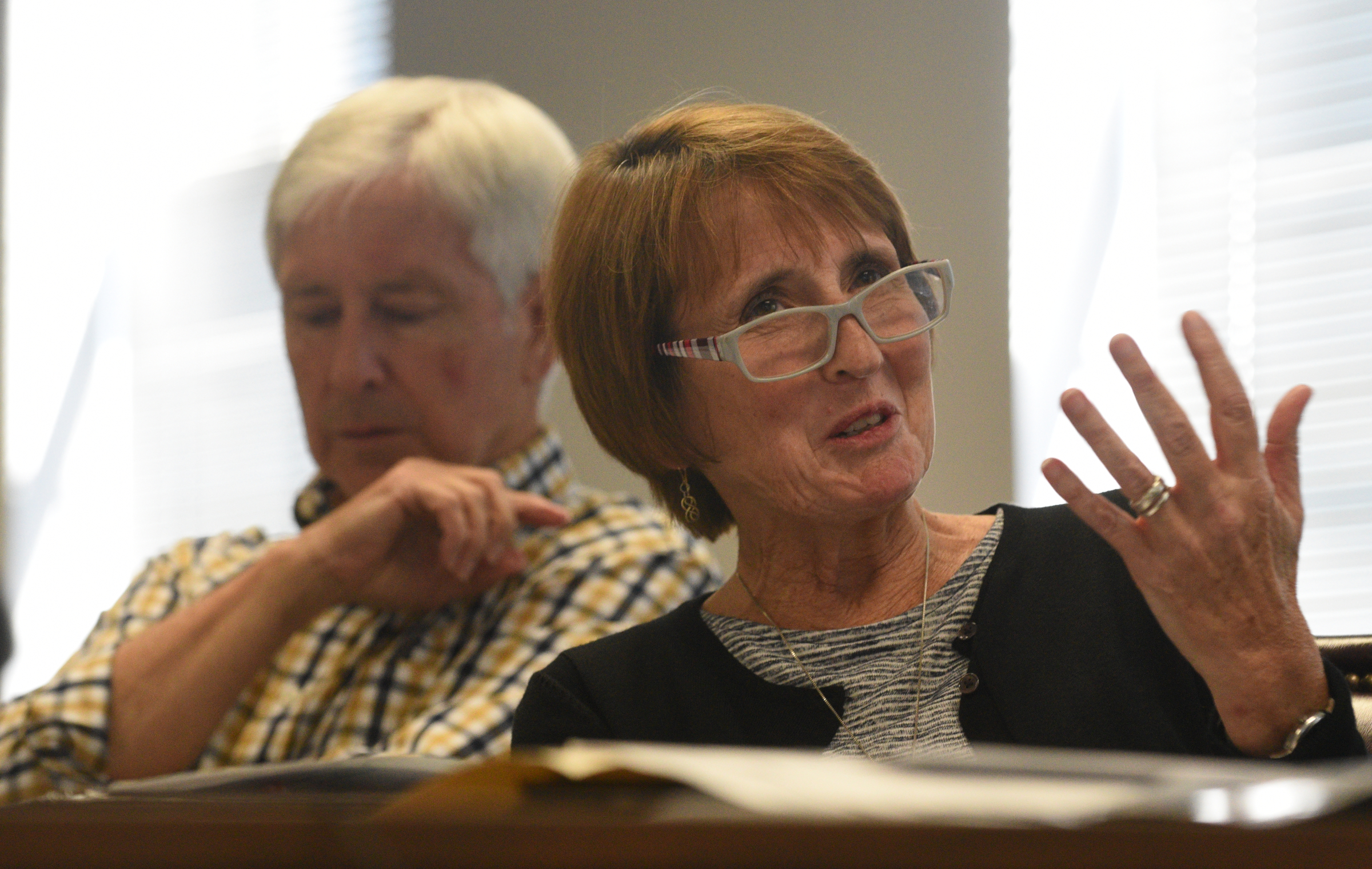 School board members Kathy Lennon, right, asks a question while Joe Galloway listens as superintendent candidate Stuart Greenberg speaks Monday, May 8, 2017 in the superintendent's conference room.