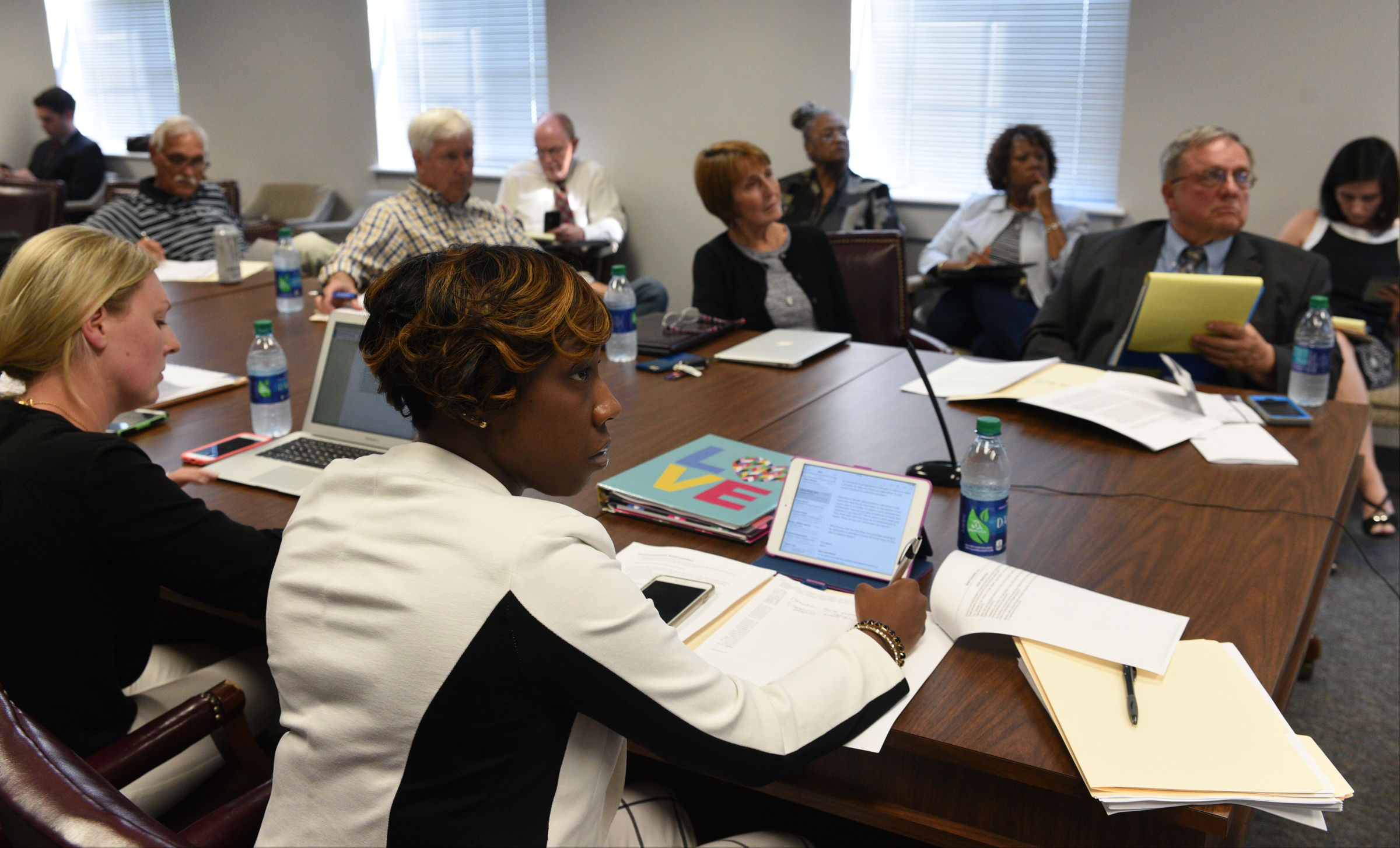 School board members listen as superintendent candidate Stuart Greenberg speaks Monday, May 8, 2017 in the superintendent's conference room.