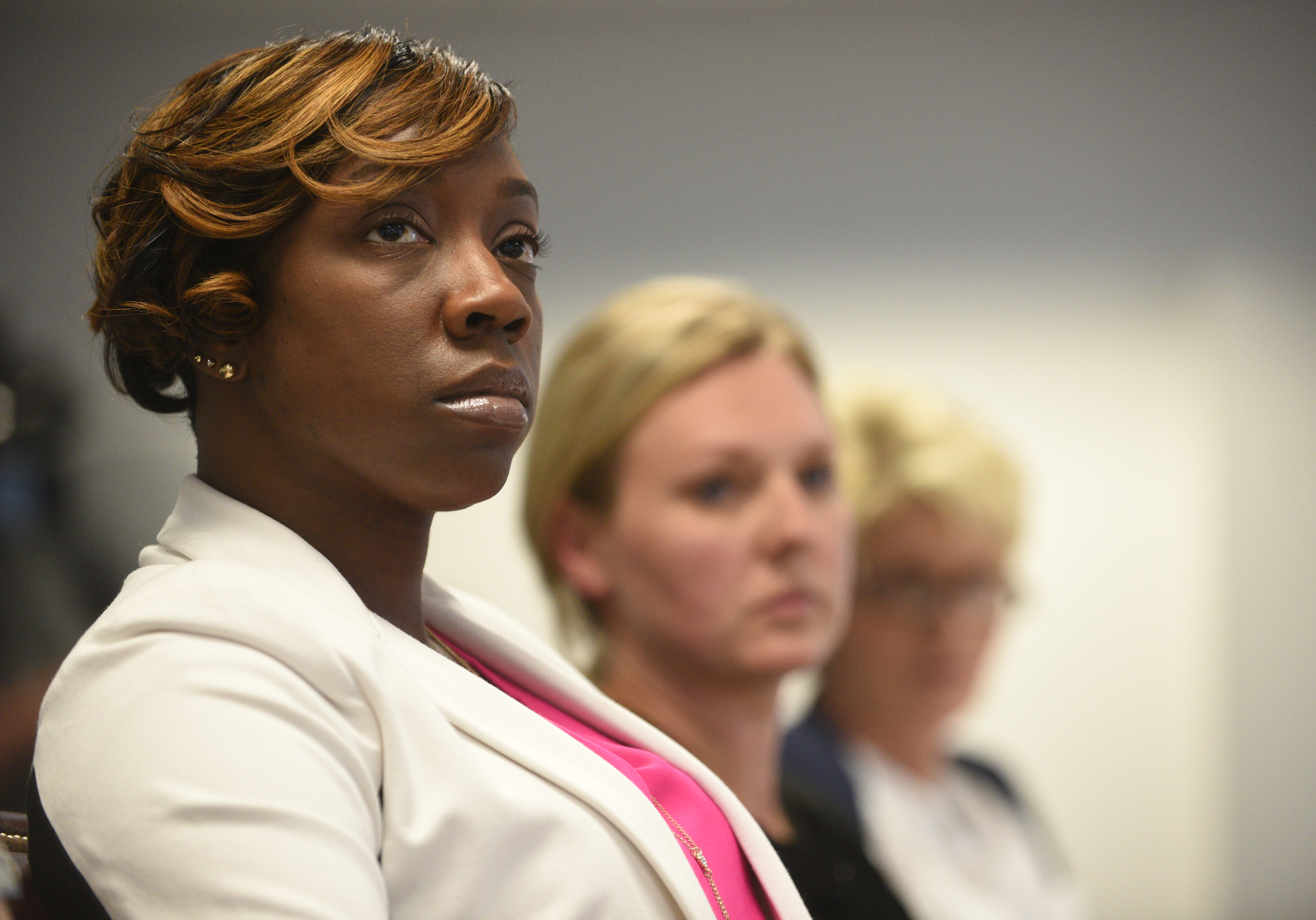School board members Karitsa Mosley Jones, left, and Tiffanie Robinson listen as superintendent candidate Stuart Greenberg speaks Monday, May 8, 2017 in the superintendent's conference room.