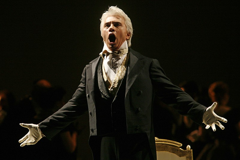 
              FILE - In this Feb. 6, 2007, file photo, Dmitri Hvorostovsky performs during the final dress rehearsal for the opera "Eugene Onegin" in New York. Hvorostovsky made a surprise appearance Sunday, May 7, 2017, at the Metropolitan Opera gala celebrating the 50th anniversary of the company's move to Lincoln Center in 1966. Hvorostovsky has been undergoing treatment for a brain tumor. (AP Photo/Shiho Fukada, File)
            