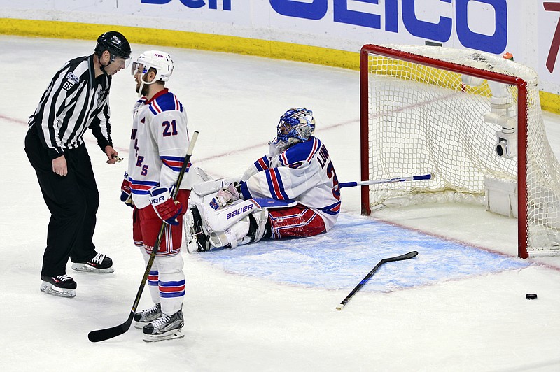 
              New York Rangers goalie Henrik Lundqvist (30) and center Derek Stepan (21) react after the Ottawa Senators scored to tie the game late in the third period in Game 5 in the second-round of the NHL hockey Stanley Cup playoffs in Ottawa on Saturday, May 6, 2017. (Sean Kilpatrick/The Canadian Press via AP)
            