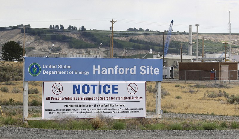 
              FILE - In this July 9, 2014 file photo, a sign informs visitors of prohibited items on the Hanford Nuclear Reservation near Richland, Wash. An emergency has been declared Tuesday, May 9, 2017, at the Hanford Nuclear Reservation after a portion of a tunnel that contained rail cars full of nuclear waste collapsed. Randy Bradbury, a spokesman for the Washington state Department of Ecology, said officials detected no release of radiation and no workers were injured.   (AP Photo/Ted S. Warren, File)
            