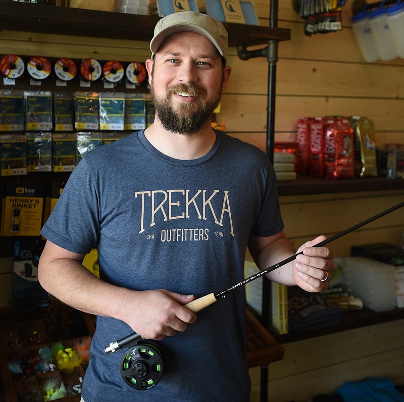 Chris Loizeaux stands in Trekka Outfitters on Dayton Blvd. when it opened in 2015. He's since expanded out from the tiny 450 sq. ft. location and into a new, much larger space on Manufacturer's Road.