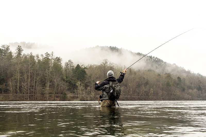 Chris Loizeaux casts while fly fishing on the Hiwassee River. He said he's looking forward to being able to offer the Chattanooga fly fishing community more with his new shop.