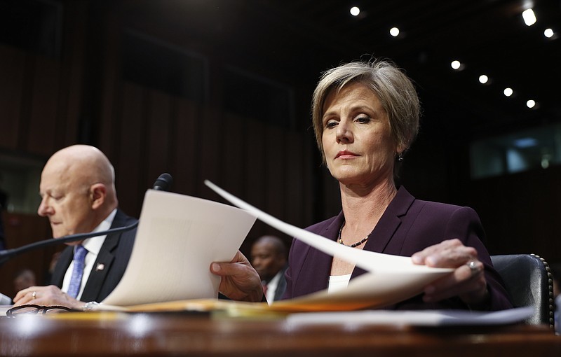 Former acting Attorney General Sally Yates, right, and former National Intelligence Director James Clapper, prepare to testify on Capitol Hill in Washington on Monday before the Senate Judiciary subcommittee on Crime and Terrorism hearing: "Russian Interference in the 2016 United States Election." (AP Photo/Carolyn Kaster)
