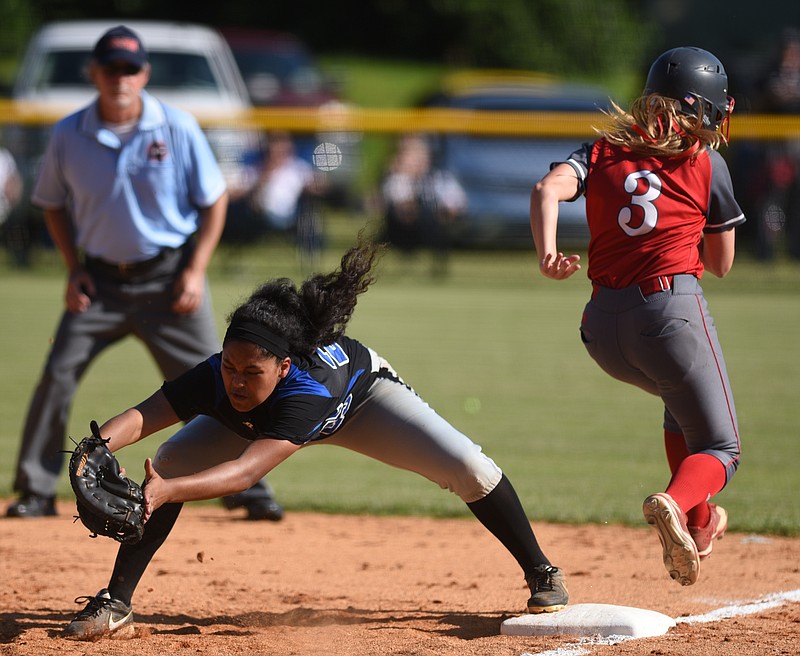 Baylor's Abby McNamara safely reaches first as GPS's Ariana Whatley reaches for the ball Tuesday, May 9, 2017 at GPS.