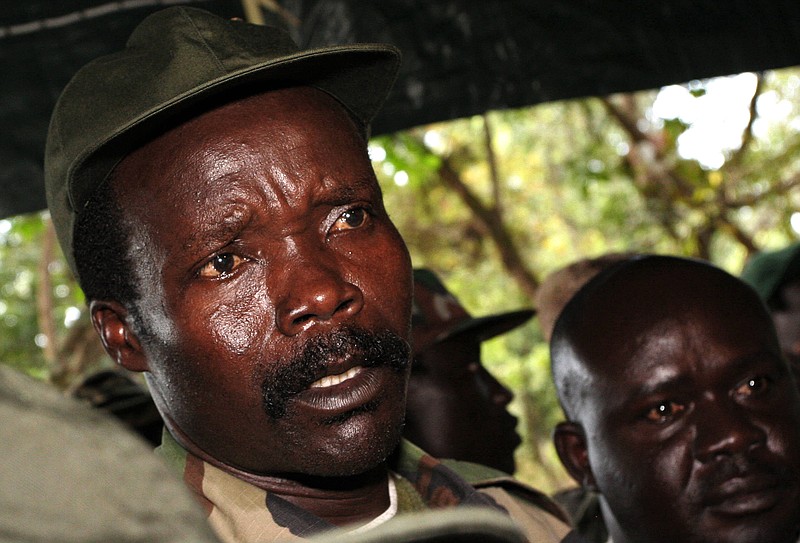 
              FILE - In this Nov. 12, 2006 file photo, the leader of the Lord's Resistance Army Joseph Kony answers journalists' questions following a meeting with UN humanitarian chief Jan Egeland at Ri-Kwangba in Southern Sudan. Kony has been Africa's most notorious warlord for three decades. Now that the United States and others are ending the international manhunt for him and his Lord's Resistance Army, it appears Kony may never be brought to justice. (AP Photo/Stuart Price, File)
            