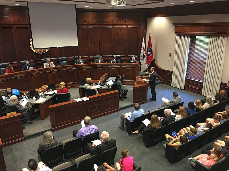 Charles Wood, vice president of economic development for the Chattanooga Area Chamber of Commerce, discusses a tax break proposal for HomeServe USA with the Hamilton County Commission.