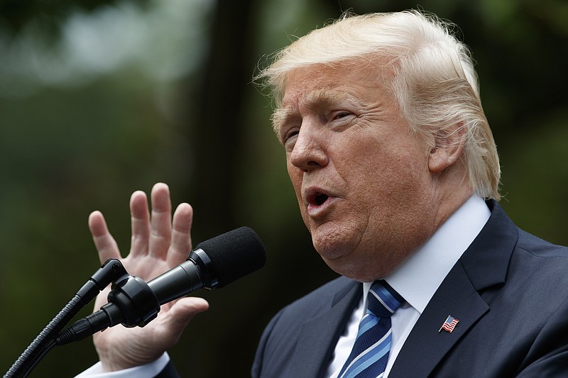 
              FILE - In this May 4, 2017 file photo, President Donald Trump speaks in the Rose Garden of the White House in Washington. A luxury Caribbean property Trump purchased four years ago is for sale, raising the possibility that a buyer could see it as a way to get on the president’s radar.  (AP Photo/Evan Vucci, File)
            