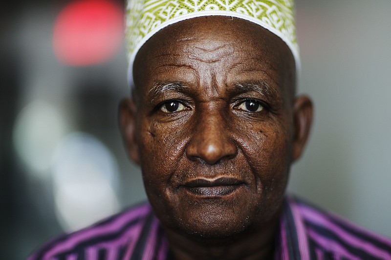 
              Somalian refugee Mohamoud Saed sits for a portrait in Clarkston, Ga., Tuesday, May 2, 2017. Saed, who was a doctor in Somalia before he fled the nation's civil war, anxiously awaits the arrival of his wife and eight children while struggling with kidney issues that he hopes could be solved with a transplant from one of his family members. The Saeds completed the lengthy refugee application process but never made the trip to the U.S. Their travel documents expired during legal wrangling over President Donald Trump's executive orders to limit the refugee program and ban travel from several countries, including Somalia. (AP Photo/David Goldman)
            