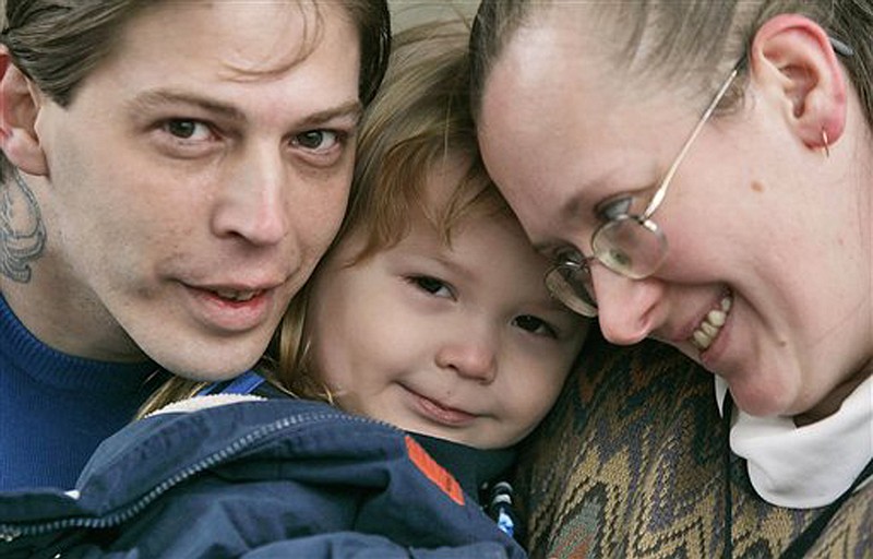 
              FILE - This Tuesday, Dec. 16, 2008 file photo, shows Isidore Heath Campbell, left, his wife, Deborah, and son Adolf Hitler Campbell, 3, in Easton, Pa. On Monday, May 8, 2017, Isidore Heath Campbell officially became Isidore Heath Hitler. He first gained national attention when a supermarket refused to decorate a birthday cake for his son, Adolf Hitler. (AP Photo/Rich Schultz, File)
            