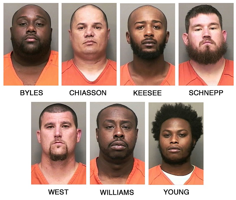 This combo of booking photos released by the Clarksville, Tenn., Police Department shows, top row from left, William L. Byles, Kenneth Chiasson, Antwon D. Keesee and Jonathan Schnepp; bottom row from left, Roger D. West, Prentice L. Williams and Joshua Young. Tennessee police say the seven bounty hunters and bail bondsmen have been indicted on first-degree murder and other charges in the killing of an unarmed man and the wounding of another. Authorities say 24-year-old Jalen Johnson and another man were wounded April 23, 2017, after the bounty hunters and bail bondsmen confronted Johnson and his three friends in a Wal-Mart parking lot in Clarksville, Tenn. Police said that neither Johnson nor his three friends had outstanding warrants. (Clarksville Police Department via AP)