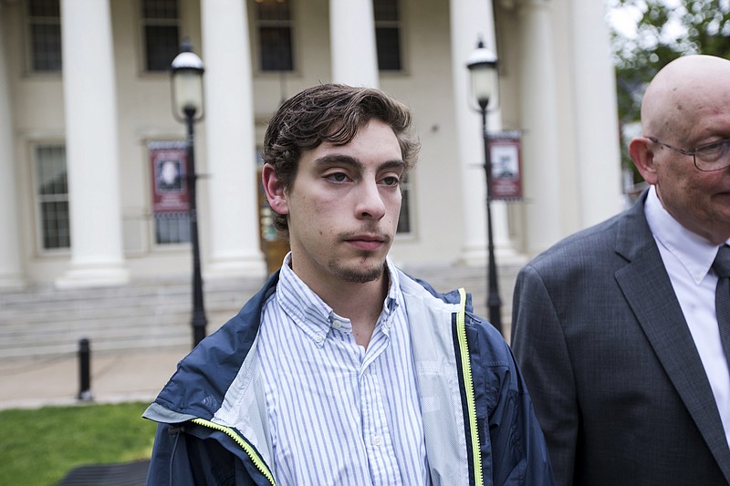 
              In this Friday, May 5, 2017 photo, Jonah Neuman of Nashville, leaves Centre County Courthouse in Bellefonte, Pa. Neuman is one of 18 Penn State Beta Theta Pi fraternity members charged in connection with the February 2017 death of Timothy Piazza. (Joe Hermitt/PennLive.com via AP)
            