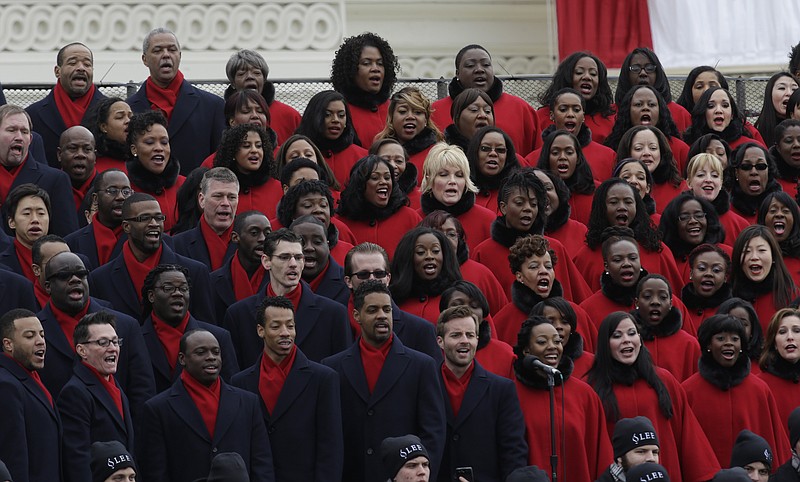 In this Monday, Jan. 21, 2013, file photo, the Lee University Festival Choir perform at the ceremonial swearing-in for President Barack Obama at the U.S. Capitol during the 57th Presidential Inauguration in Washington. (AP Photo/Paul Sancya)