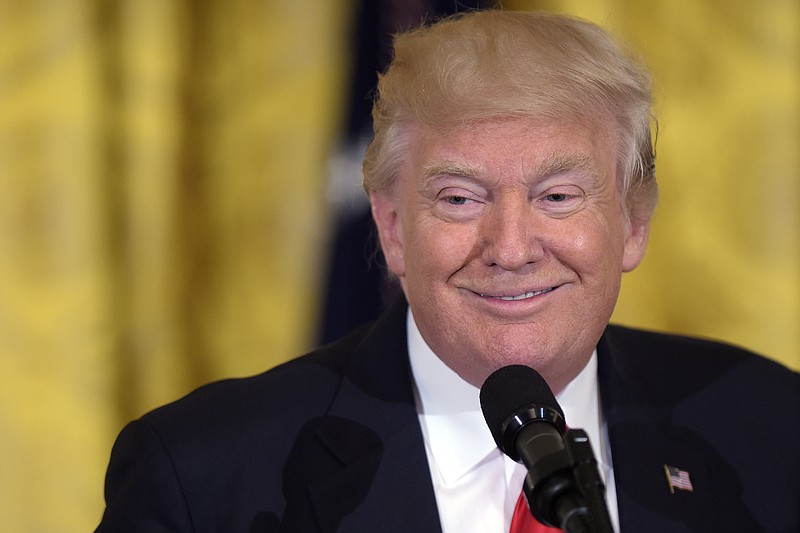 
              President Donald Trump smiles in the East Room of the White House in Washington, Friday, May 12, 2017, where he spoke to military mothers during their visit to the White House for a Mother's Day celebration. (AP Photo/Susan Walsh)
            