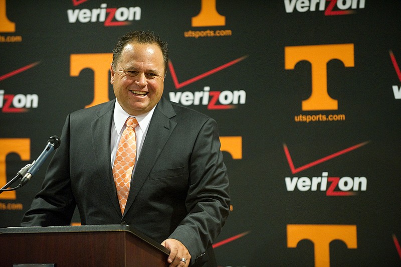 New Tennessee baseball head coach Dave Serrano smiles as he is introduced to the media during a news conference, Thursday, June 16, 2011 in Knoxville, Tenn. The former Cal State Fullerton head coach was an assistant at Tennessee from 1995-96. (AP Photo/Knoxville News Sentinel, Saul Young)