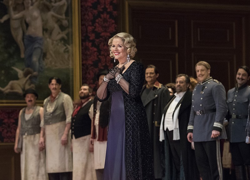 
              Soprano Renee Fleming looks to the audience during the curtain call for Richard Strauss' opera "Der Rosenkavalier" in New York on Saturday, May 13, 2017. Fleming retired the role of the Marschallin on Saturday after 22 years. (Jonathan Tichler/Metropolitan Opera via AP)
            