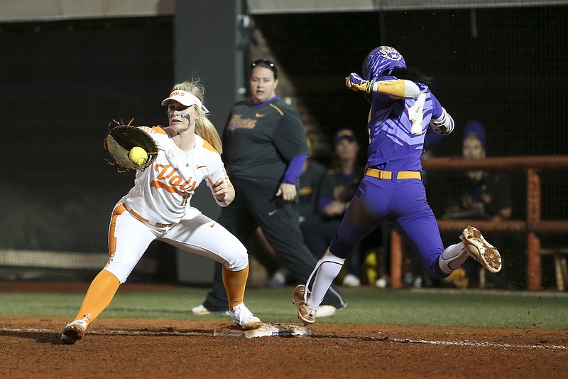 Tennessee first baseman Haley Bearden awaits the throw as LSU's Aliyah Andrews lunges toward the bag during their second-round matchup in the SEC tournament Thursday at Sherri Parker Lee Stadium in Knoxville. The Vols lost 6-2 in their only game at the tournament, but now they turn their attention to the NCAA postseason.